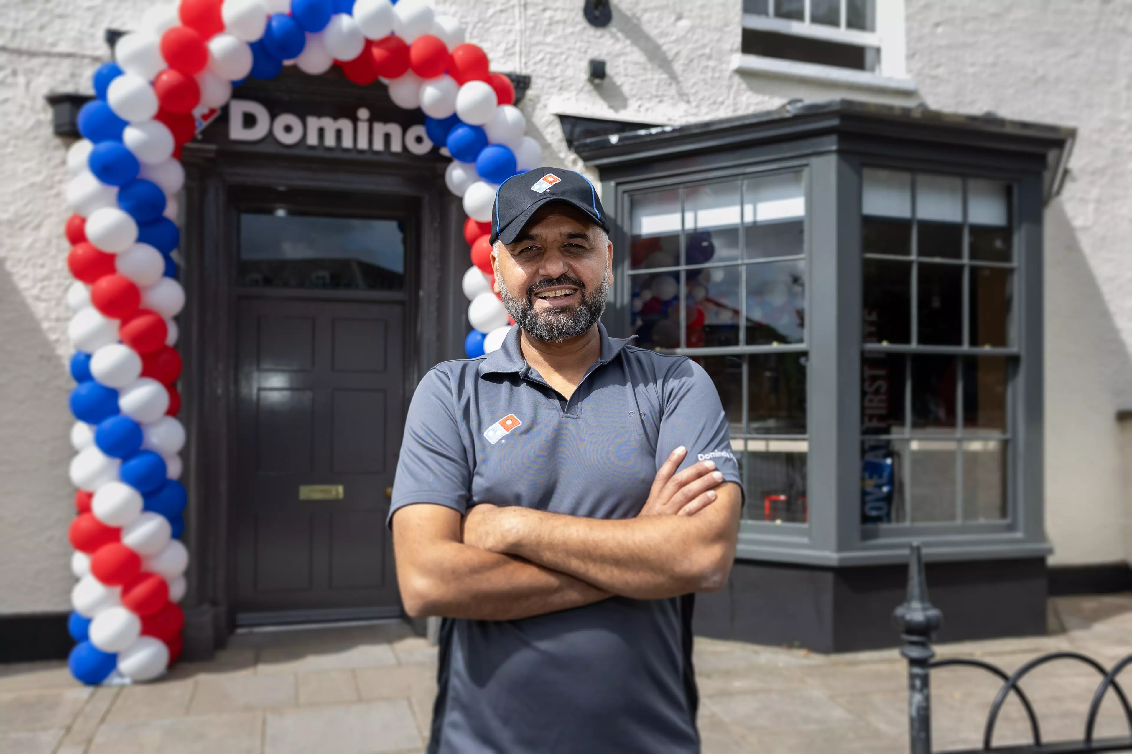 One of our homegrown heroes outside of their store opening.